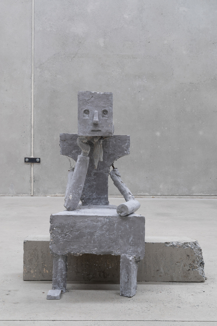Seated figure